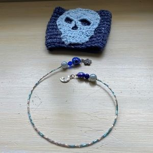 Skull cozy and beaded bookmark